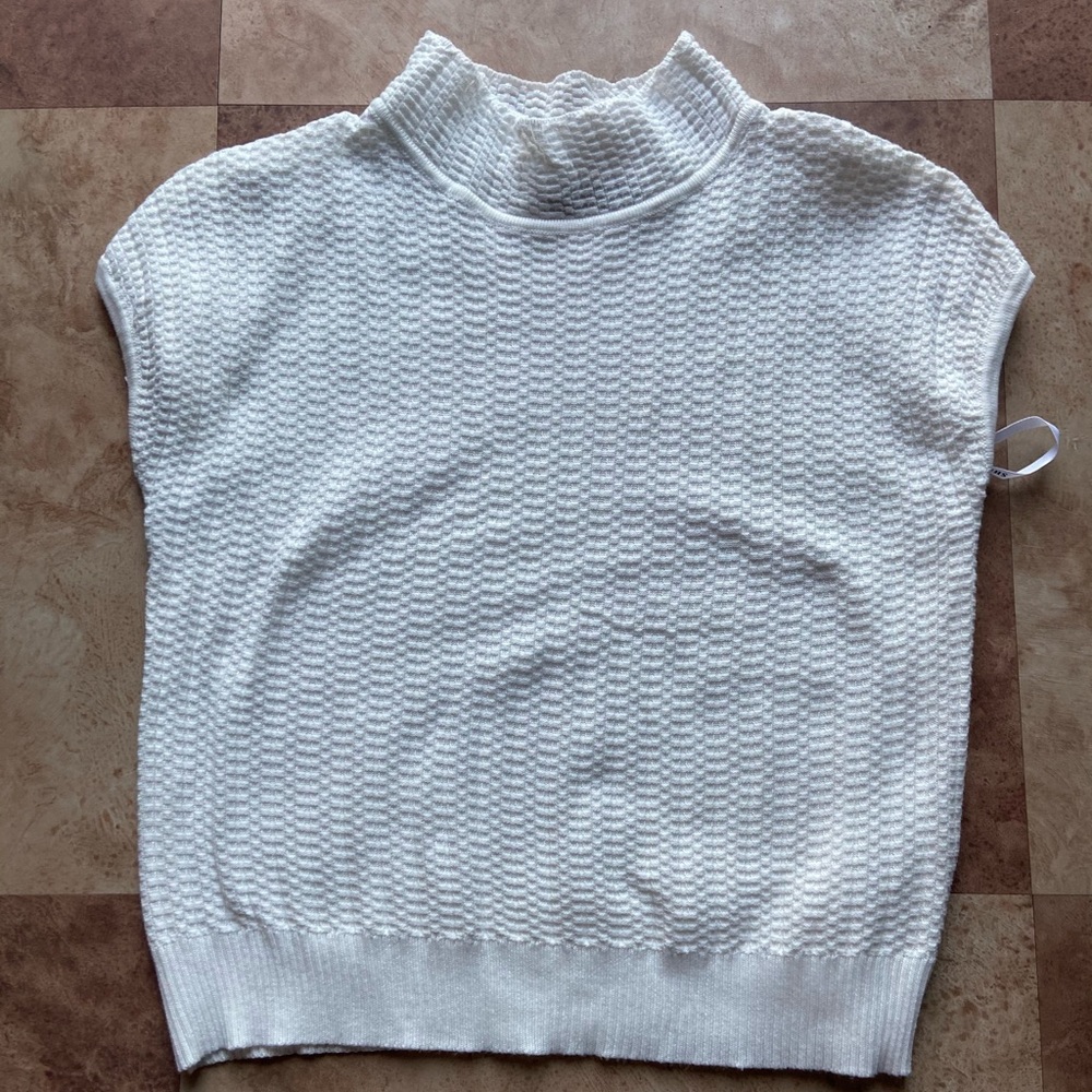 White high neck sleeveless top